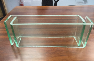 What causes the toughened glass ...